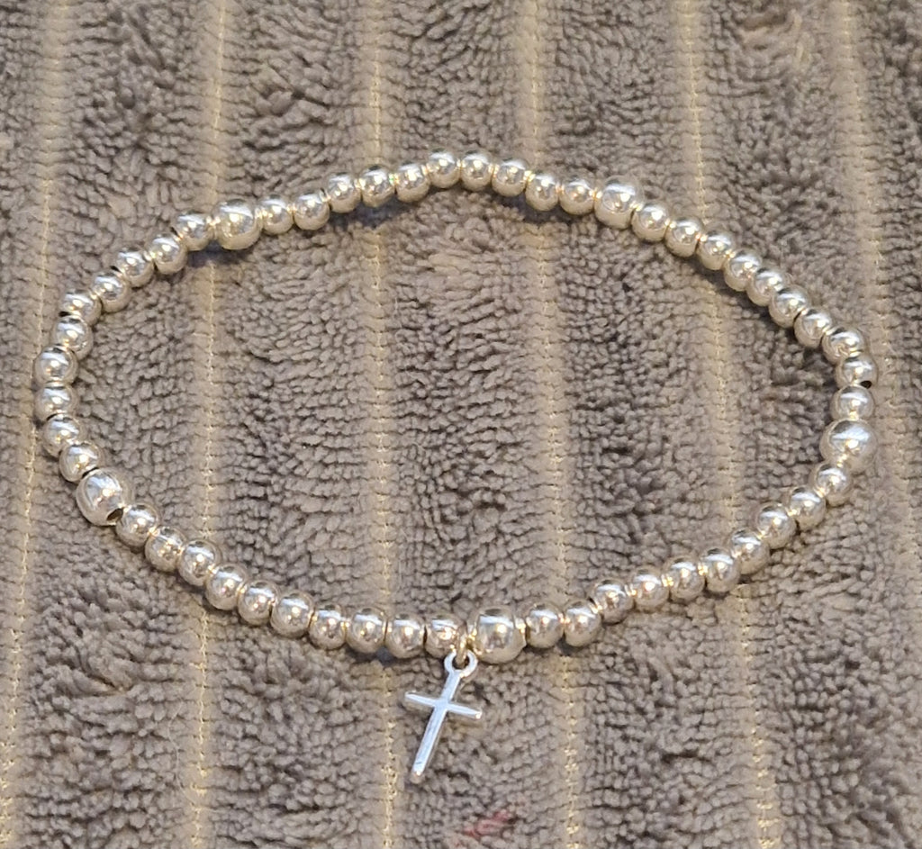 Pulsera Rosario elástica artesanal en Zamak